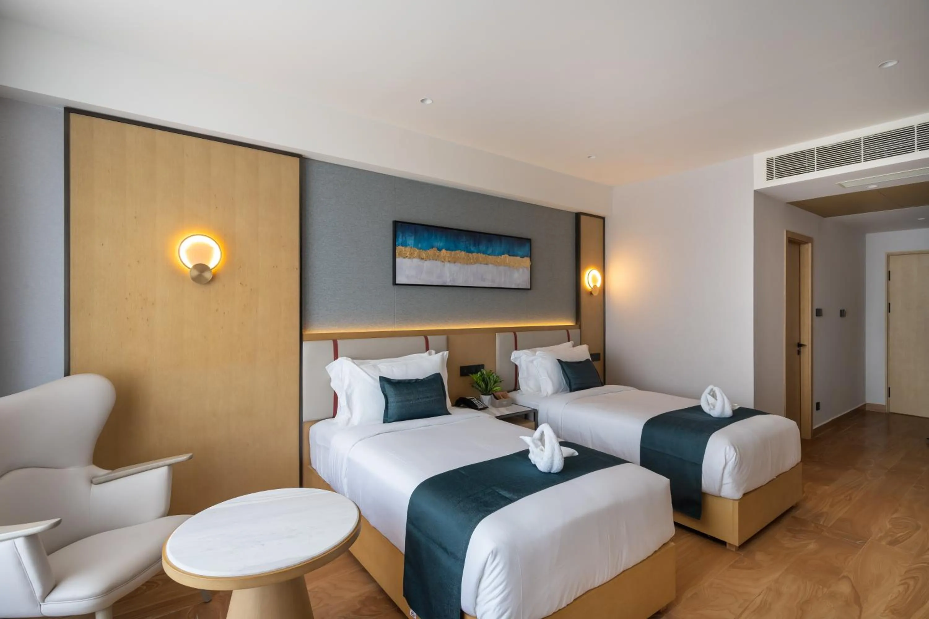 Bed in Copper Leaf Hotels, Tirunelveli