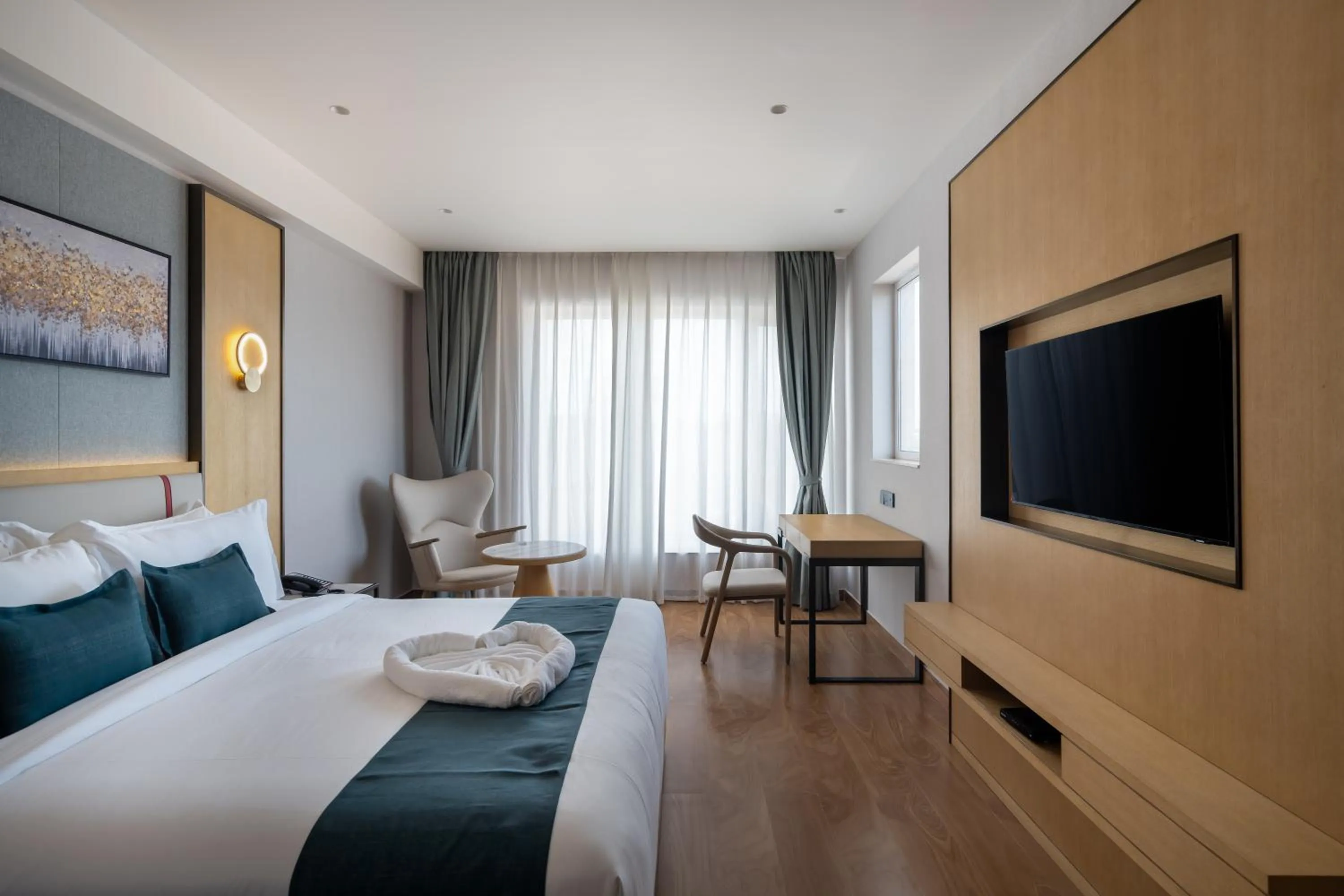 Bed in Copper Leaf Hotels, Tirunelveli