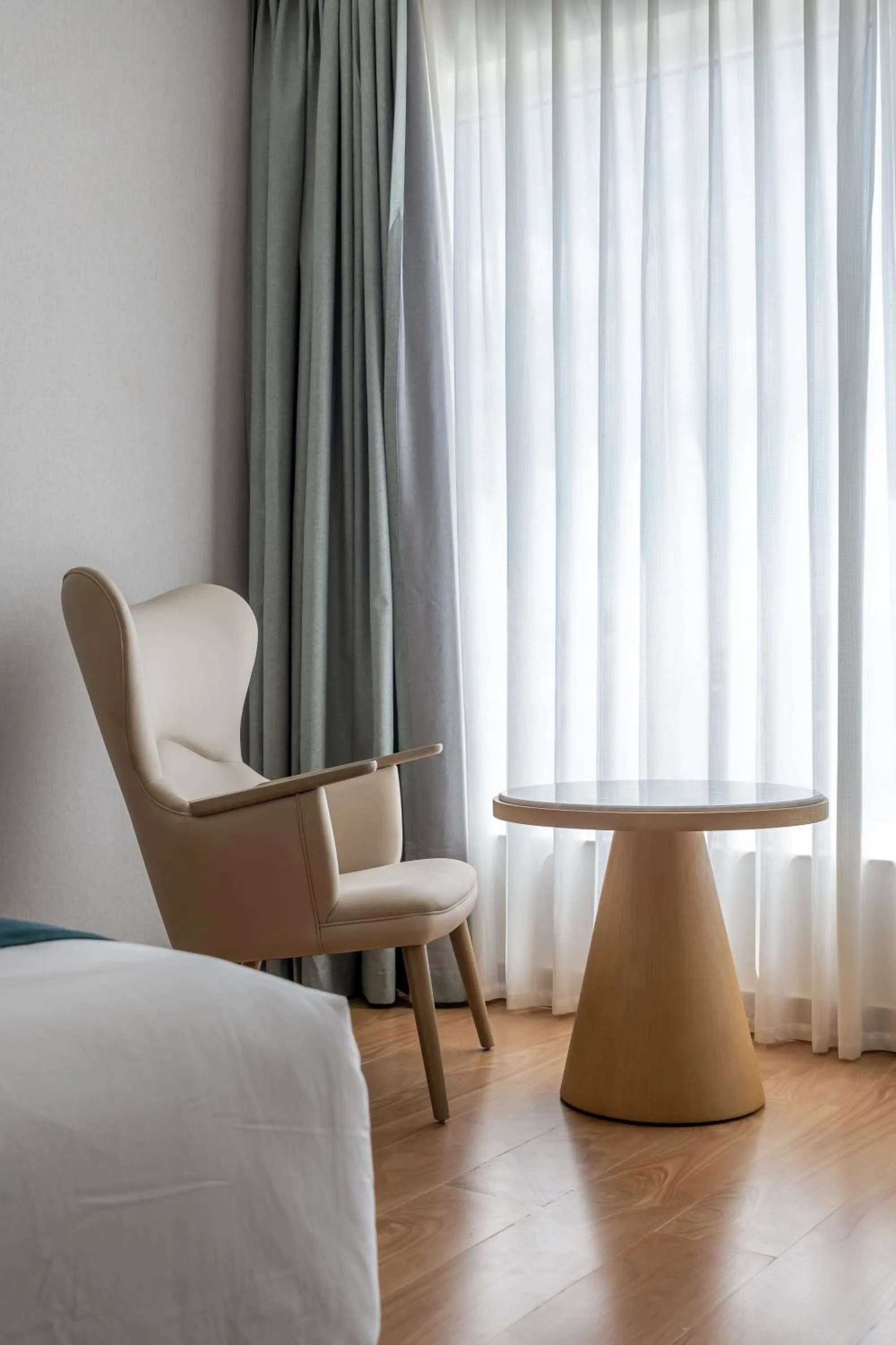 Seating area, Bed in Copper Leaf Hotels, Tirunelveli
