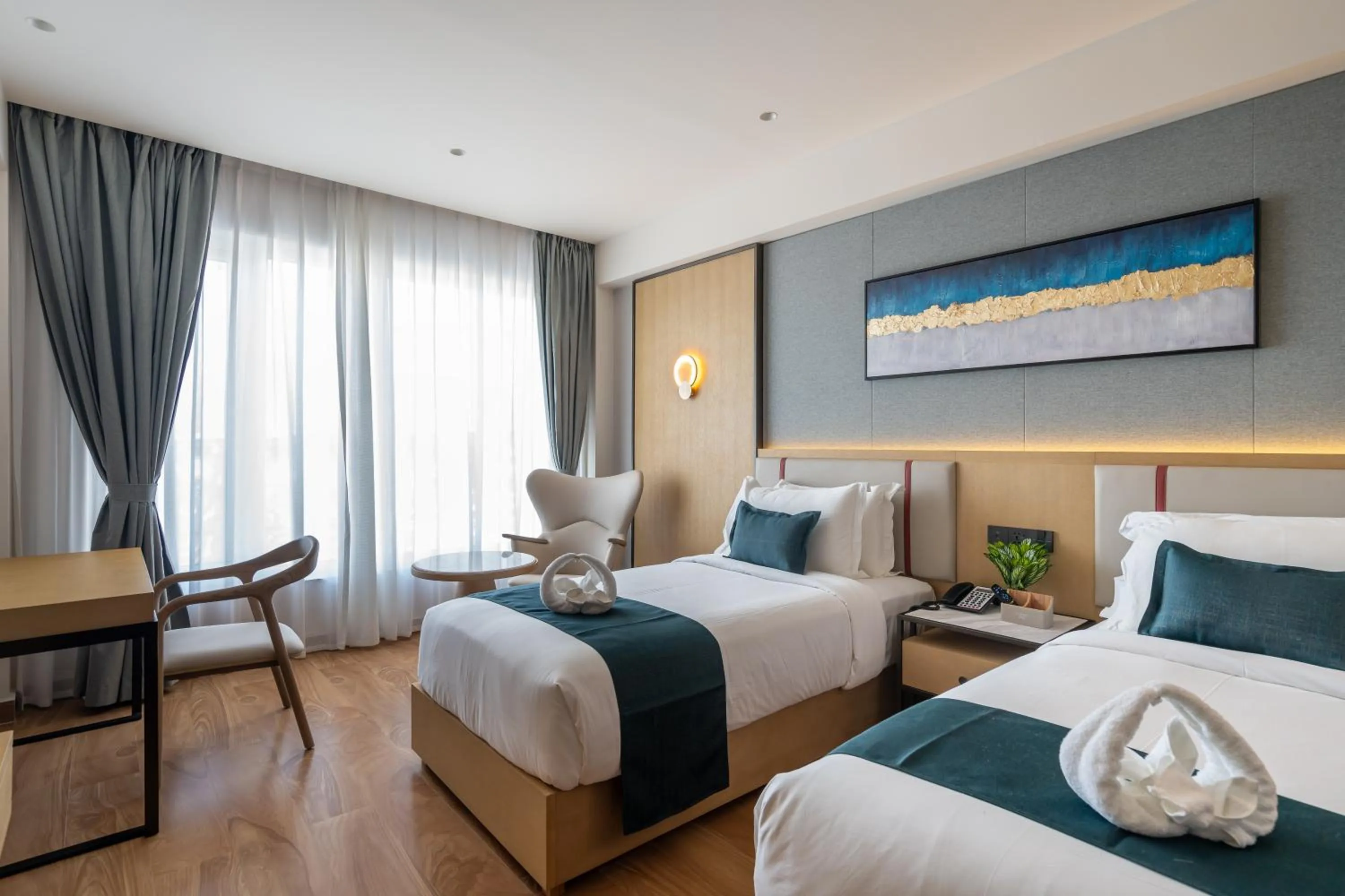 Bed in Copper Leaf Hotels, Tirunelveli