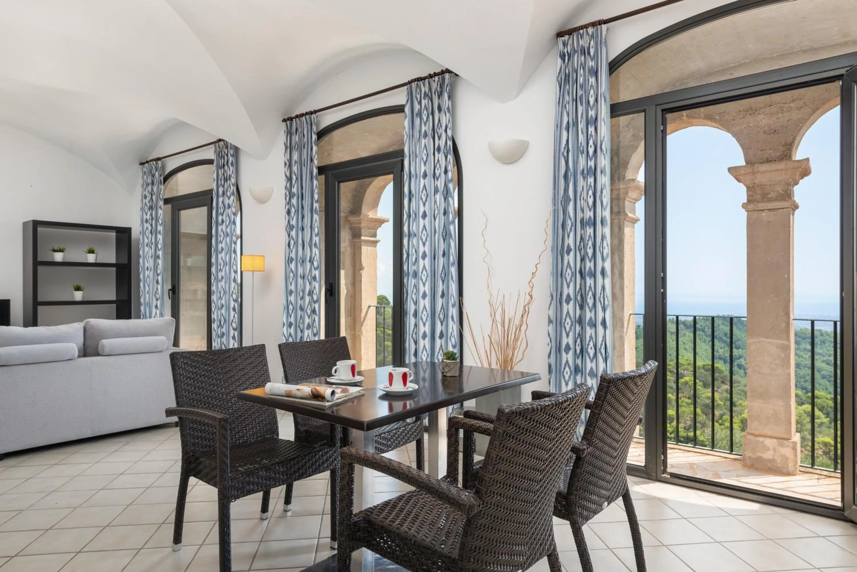 Communal lounge/ TV room in Petit Hotel Hostatgeria Sant Salvador