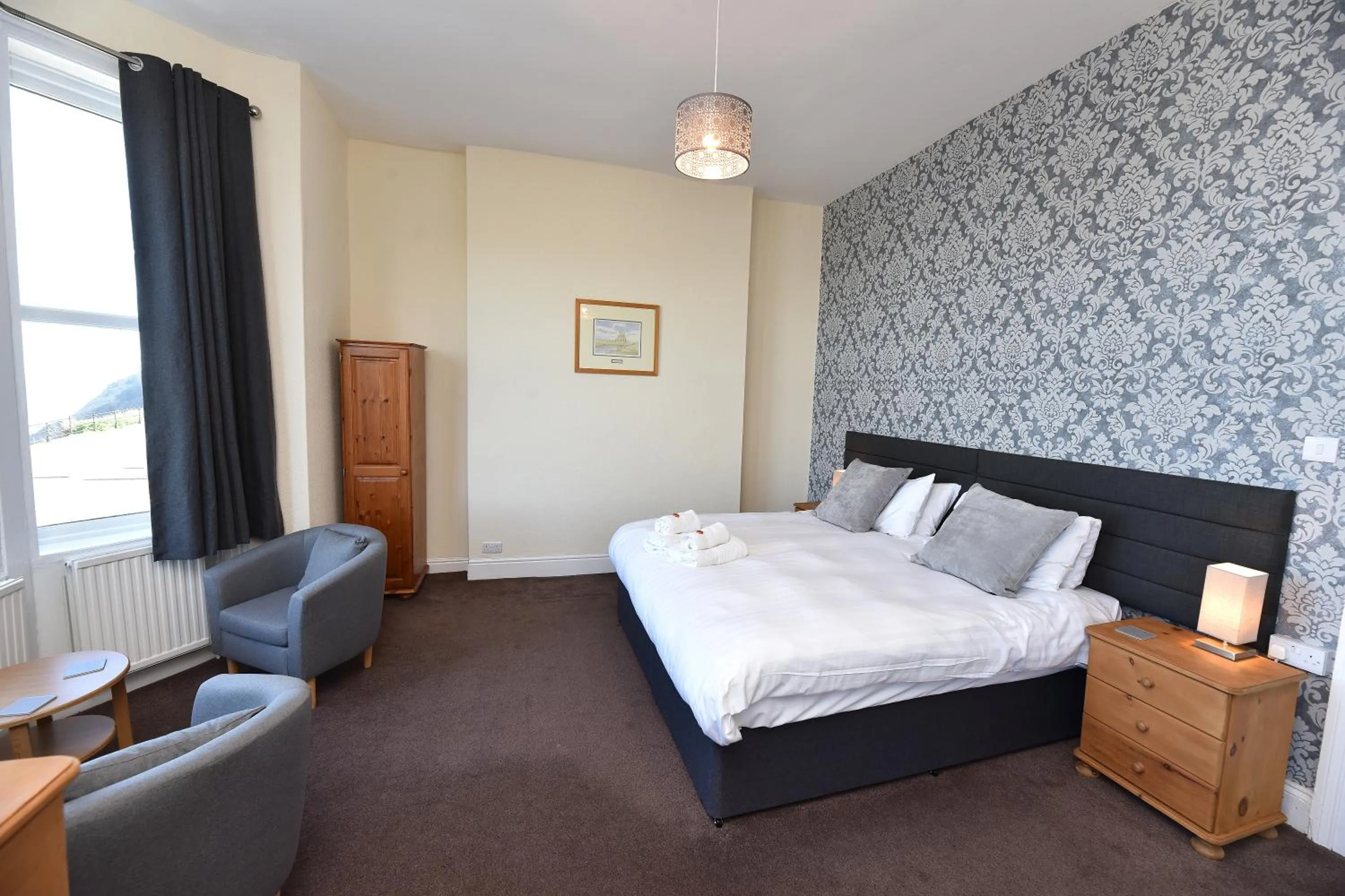 Bed in Phoenix Court Hotel