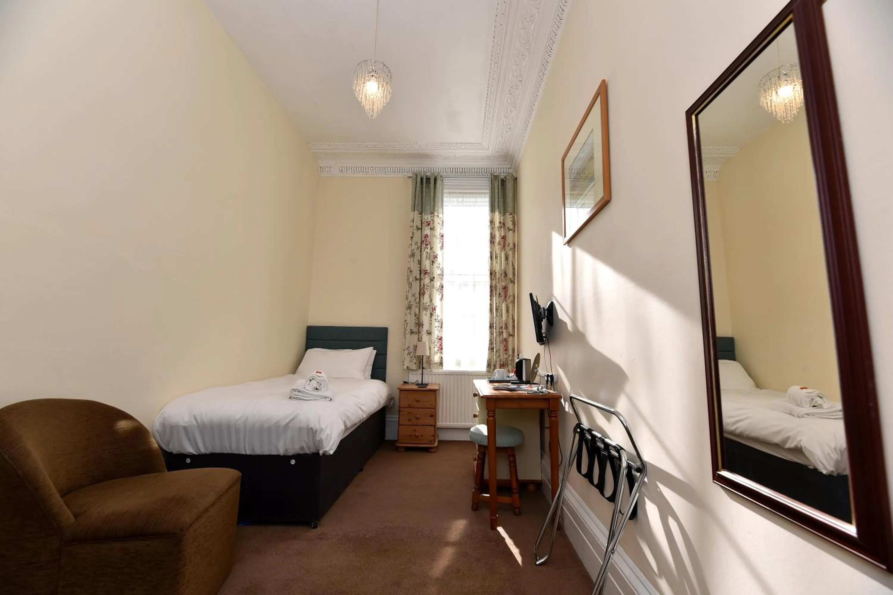 Bed in Phoenix Court Hotel