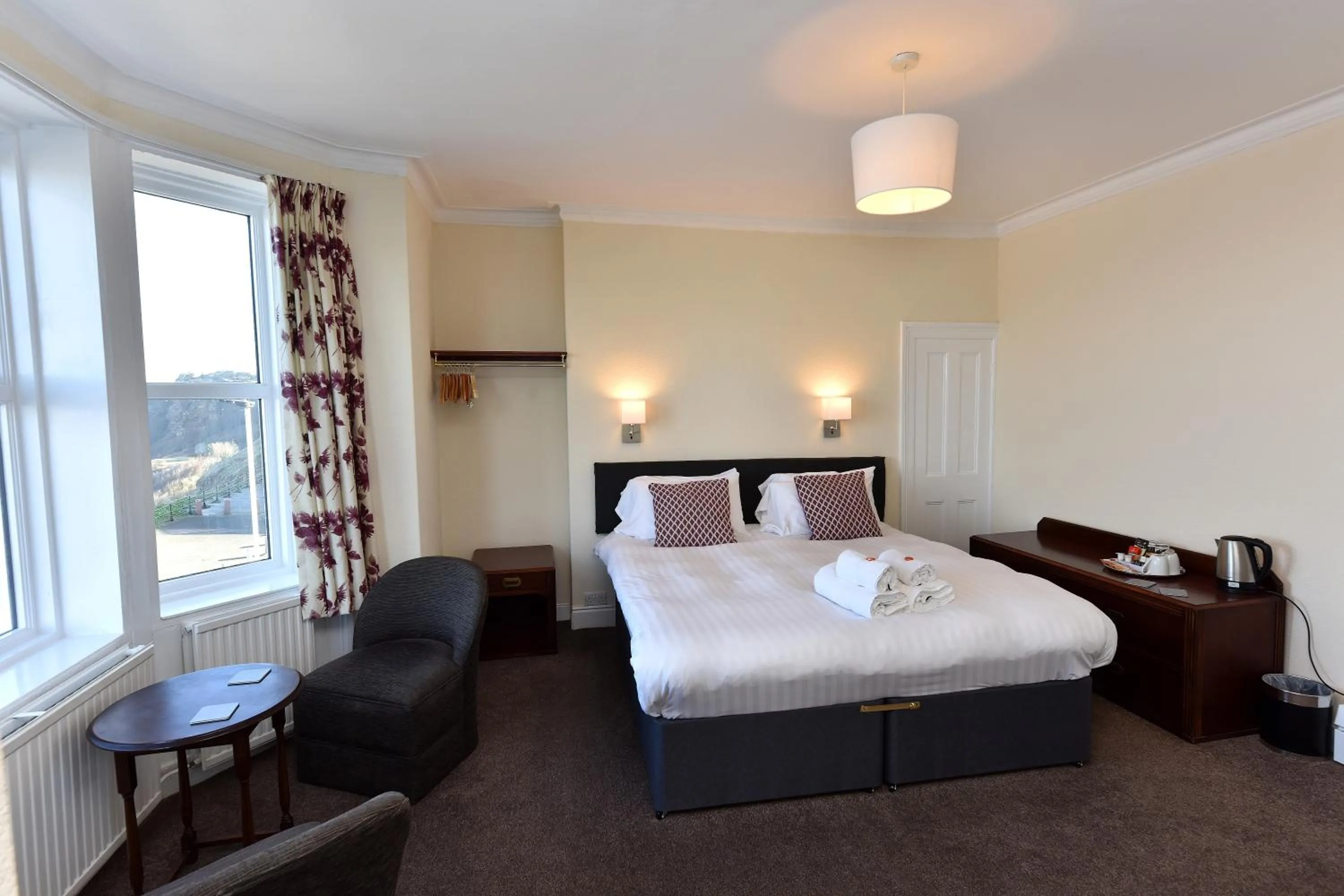 Bed in Phoenix Court Hotel