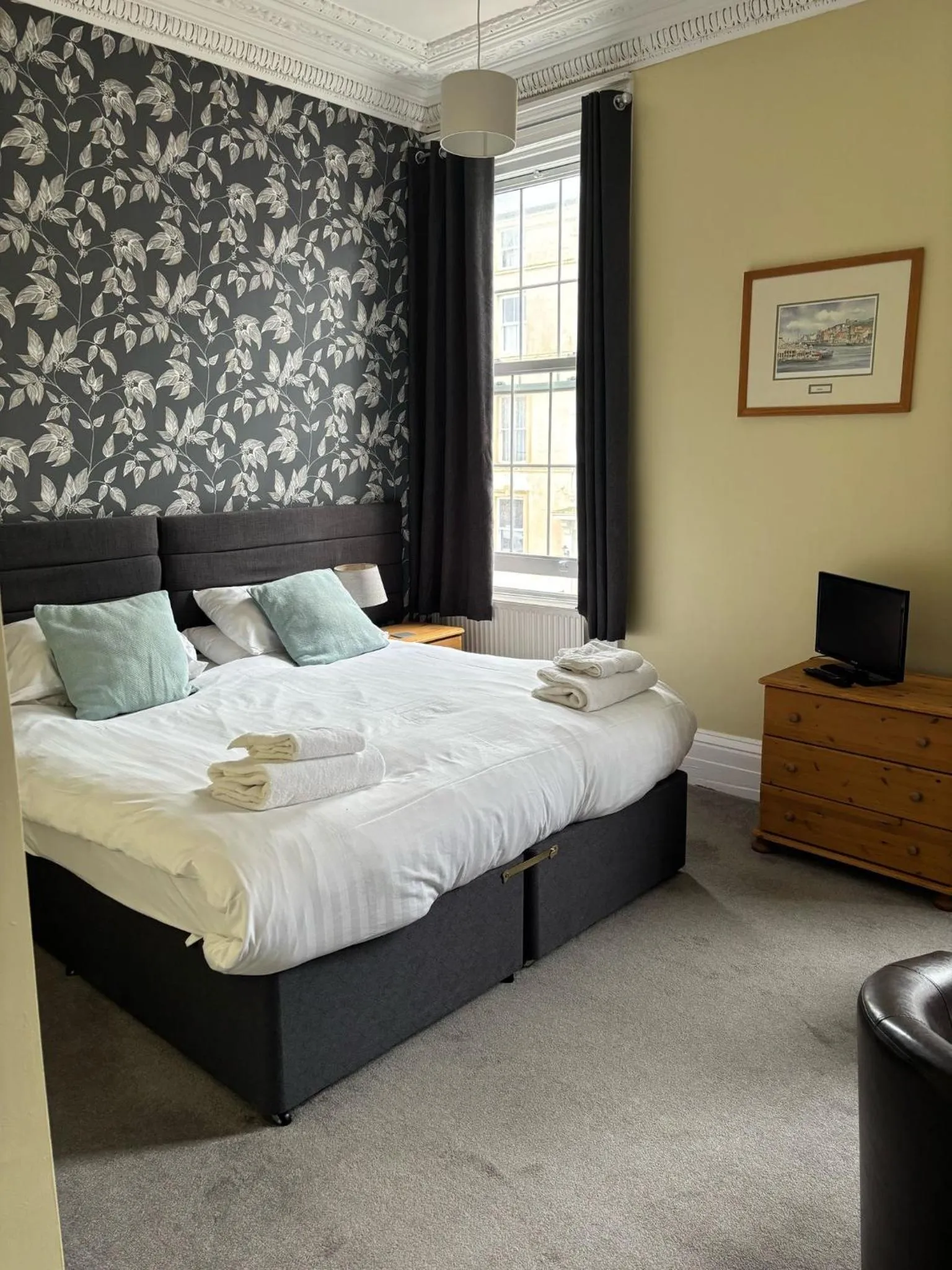 Bed in Phoenix Court Hotel