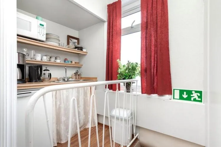 Kitchen or kitchenette in Mjoeyri Travel Holiday Homes