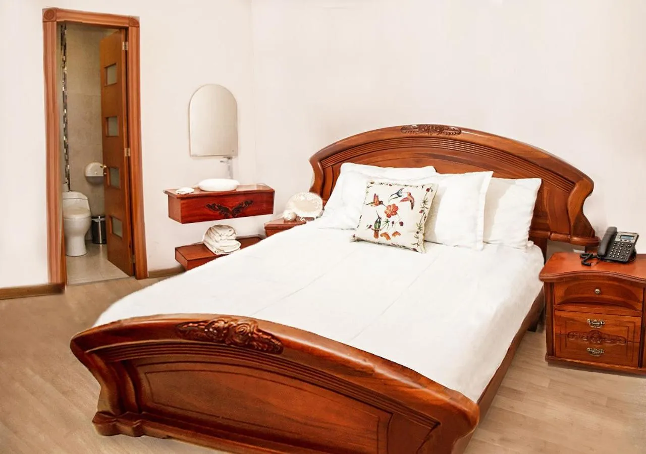Bed in Hotel Boutique Casa Ruth en Cuenca
