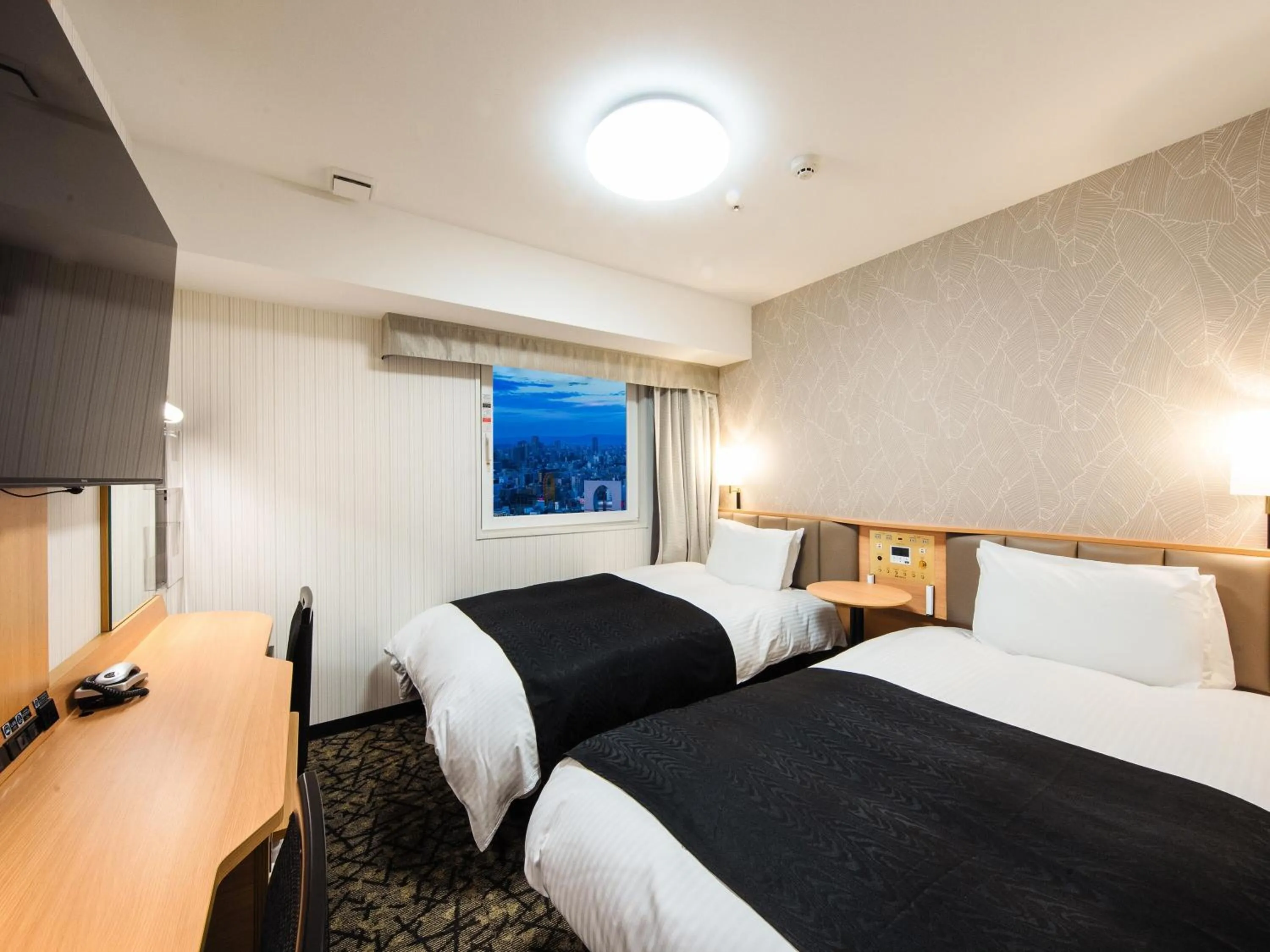 Photo of the whole room, Bed in APA Hotel & Resort Osaka Namba Ekimae Tower