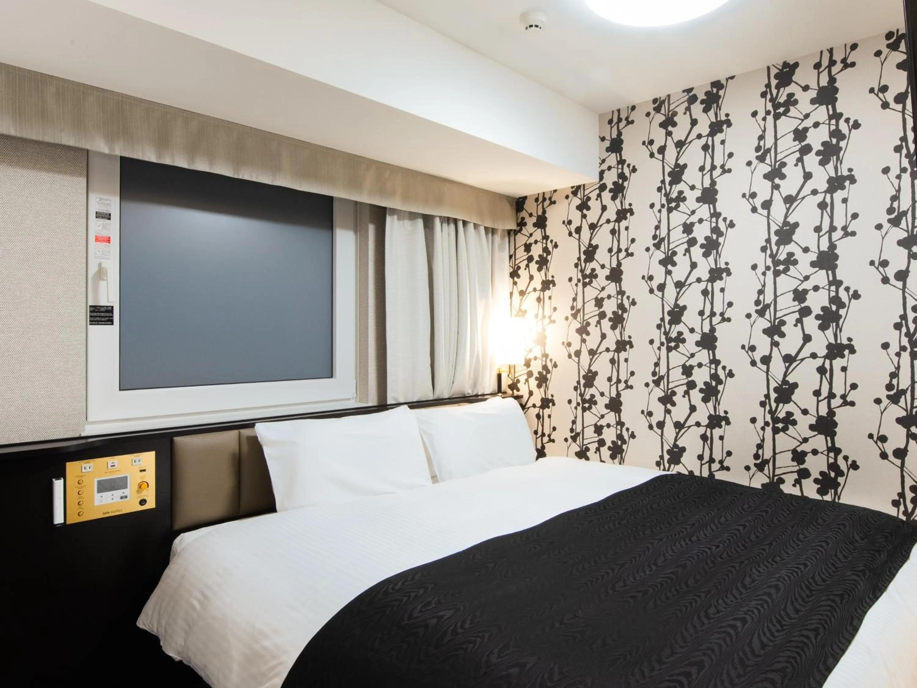 Photo of the whole room, Bed in APA Hotel & Resort Osaka Namba Ekimae Tower