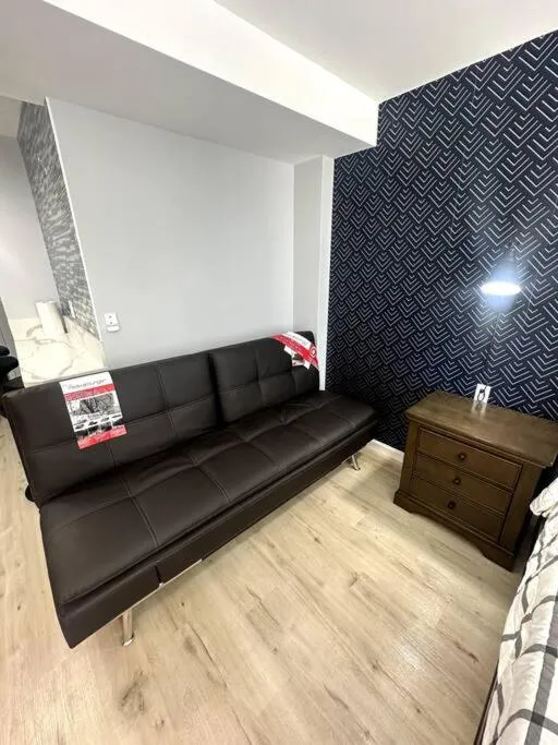 Living room in Gem of Waikiki at Inn on the Park