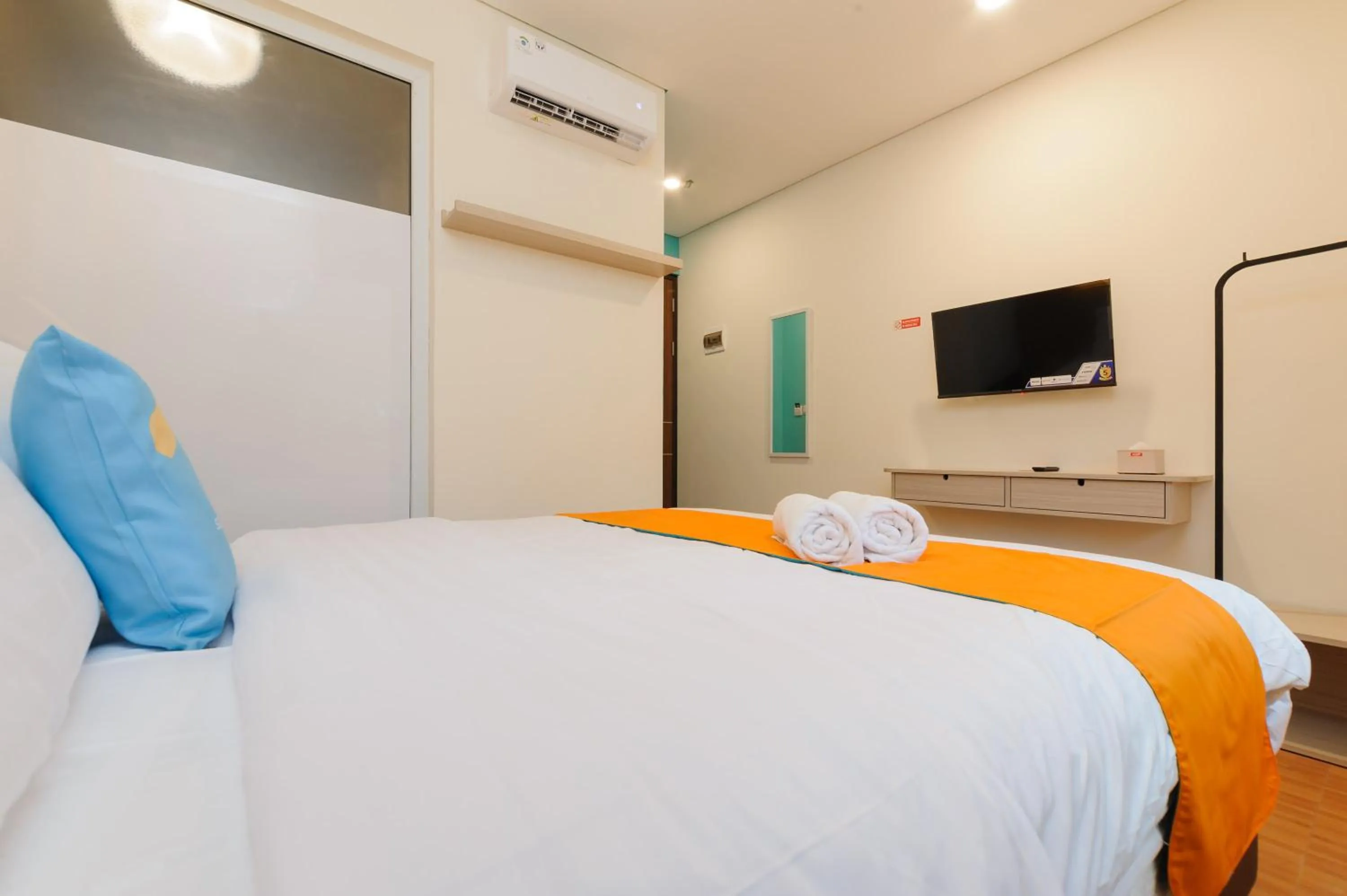 Bedroom, Bed in Sans Hotel Tajur Bogor