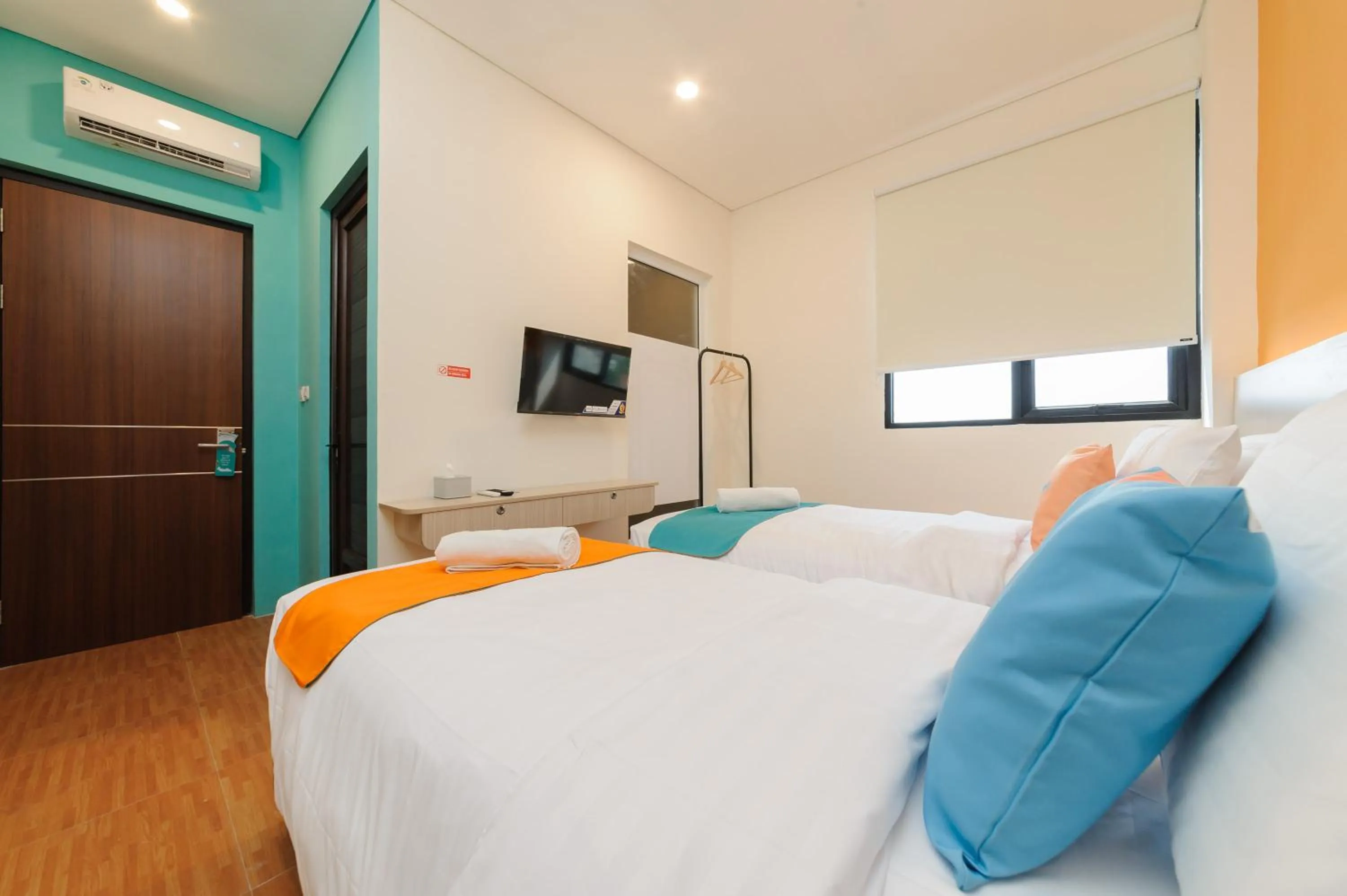 Bedroom, Bed in Sans Hotel Tajur Bogor