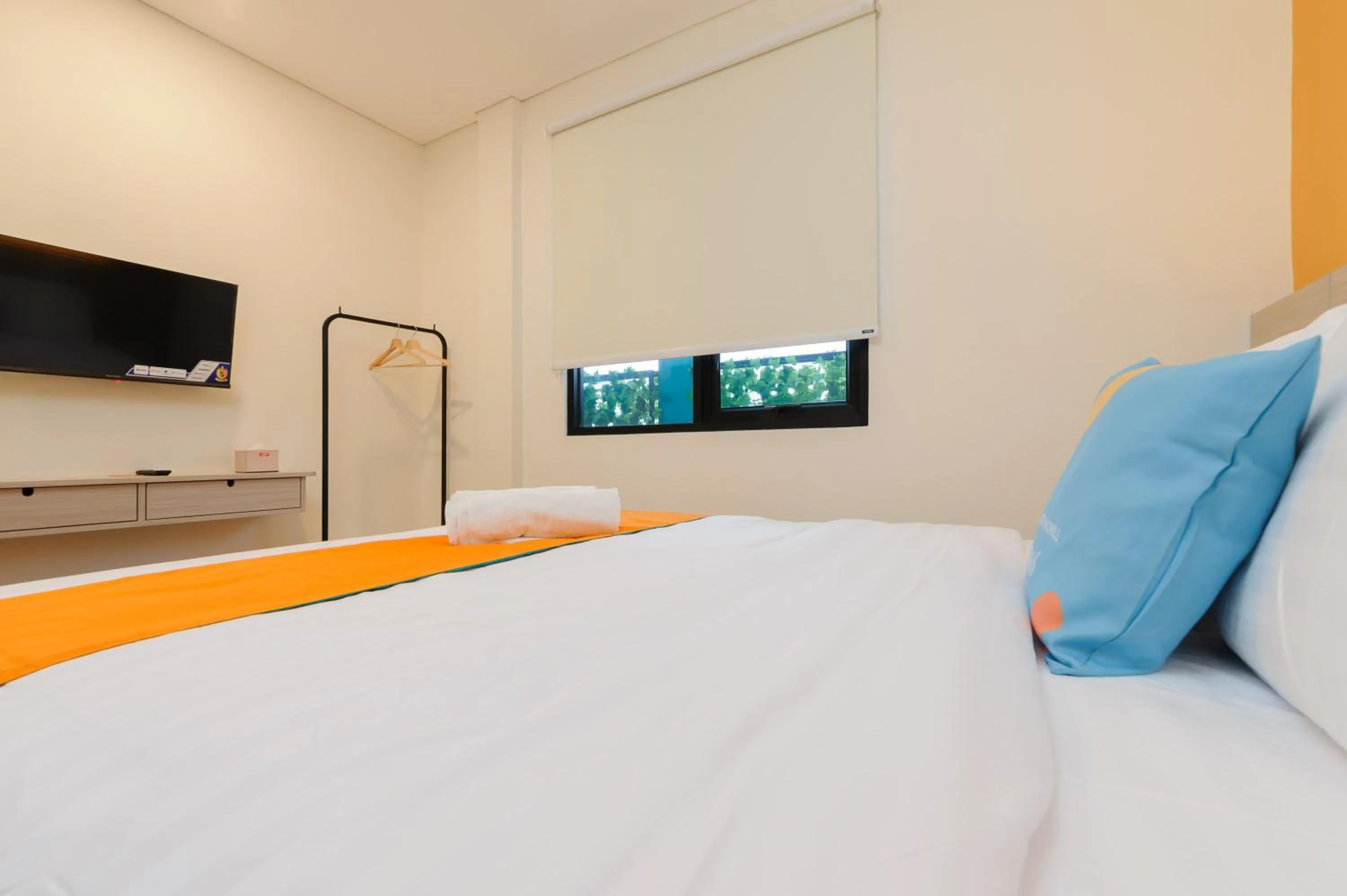 Bedroom, Bed in Sans Hotel Tajur Bogor