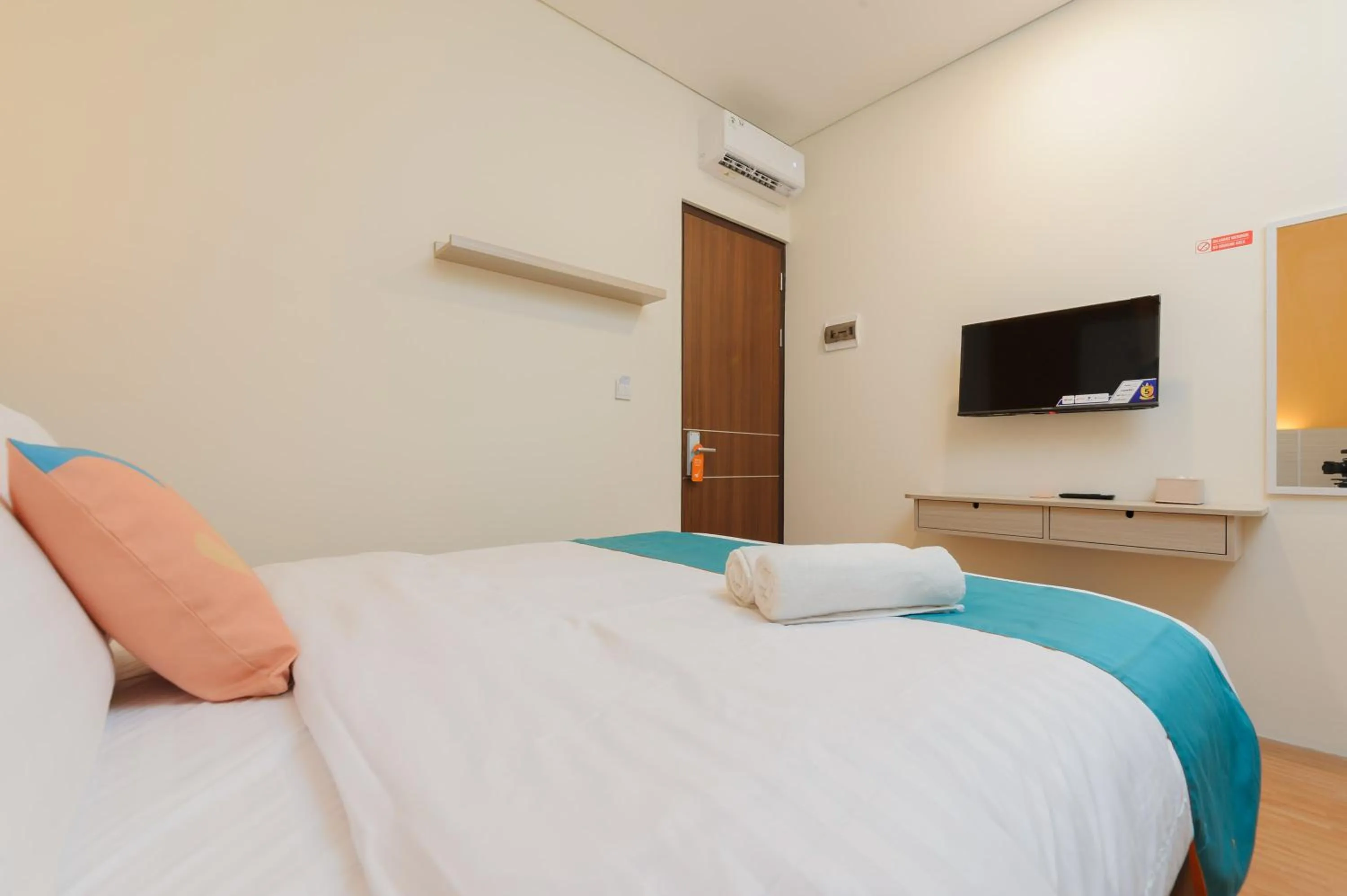 Bedroom, Bed in Sans Hotel Tajur Bogor