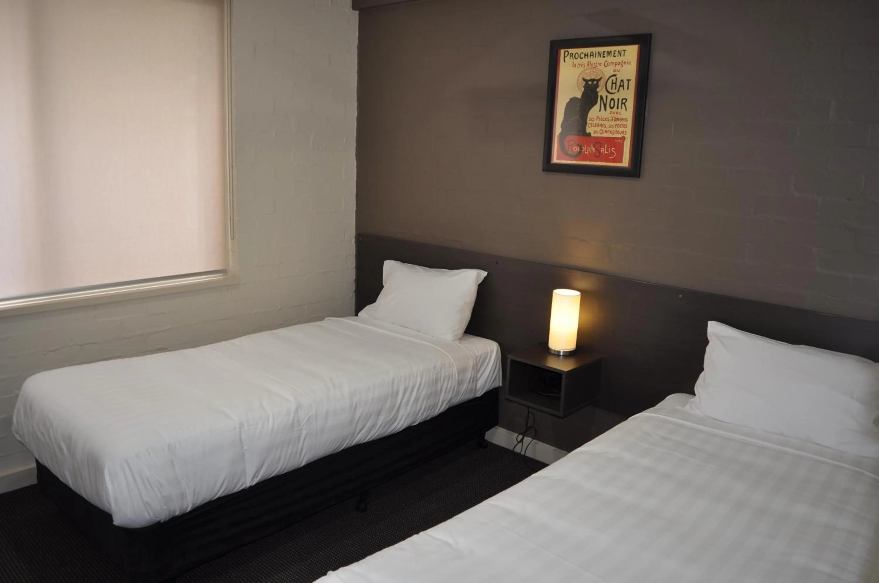 Bedroom in Brougham Arms Hotel