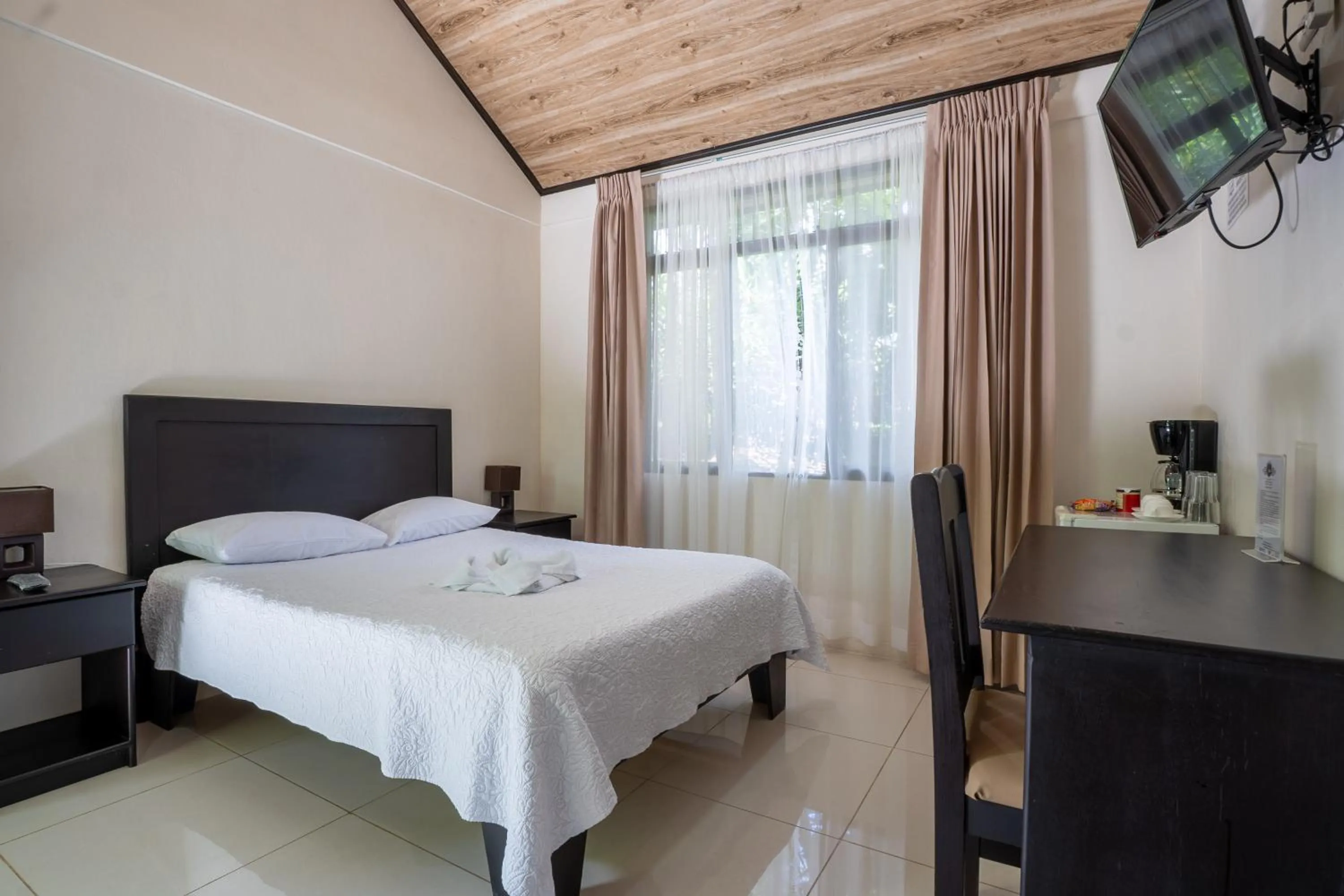 Bed in Cabañas Green House