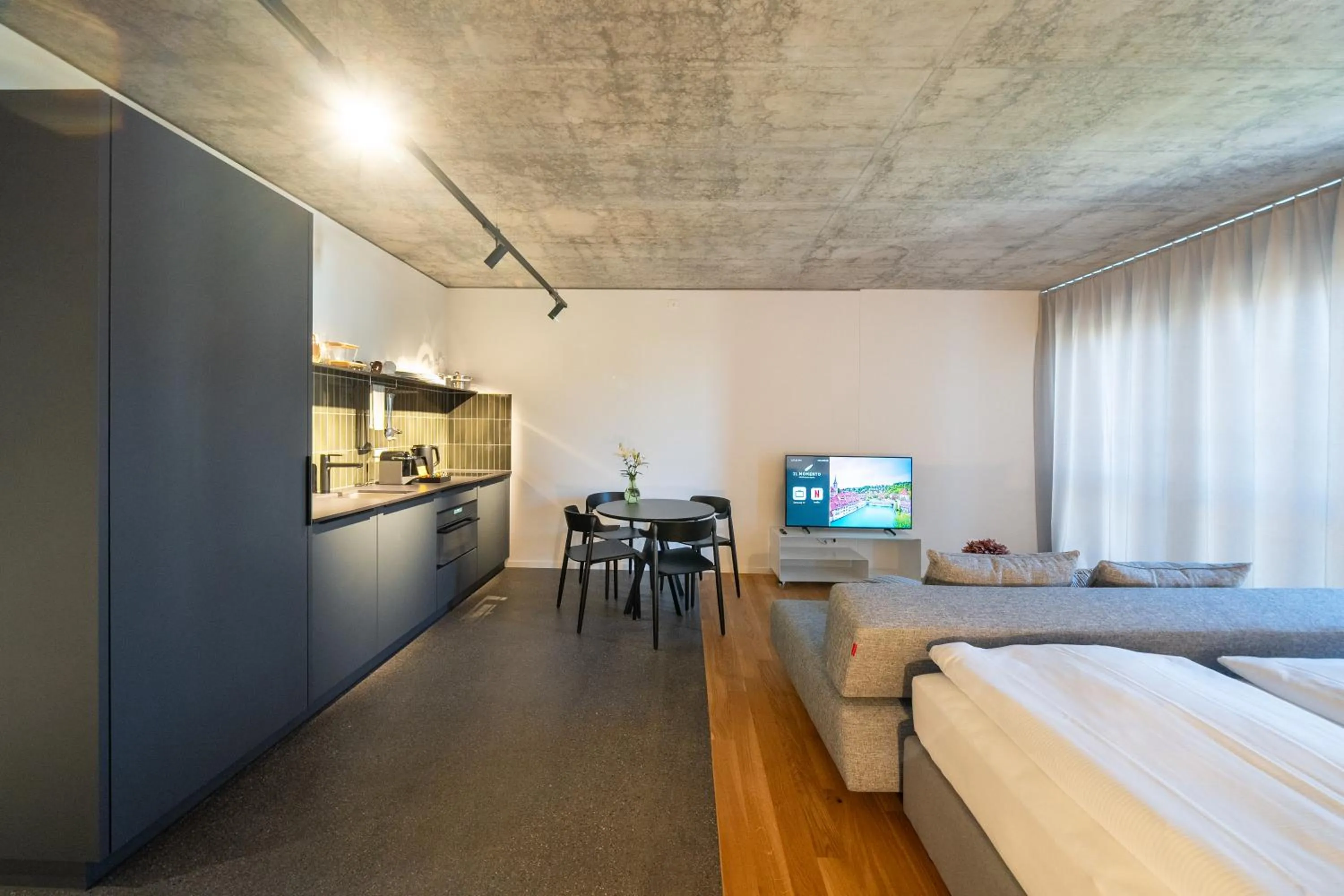 Kitchen or kitchenette, Bed in Aparthotel Il Momento Bern Expo