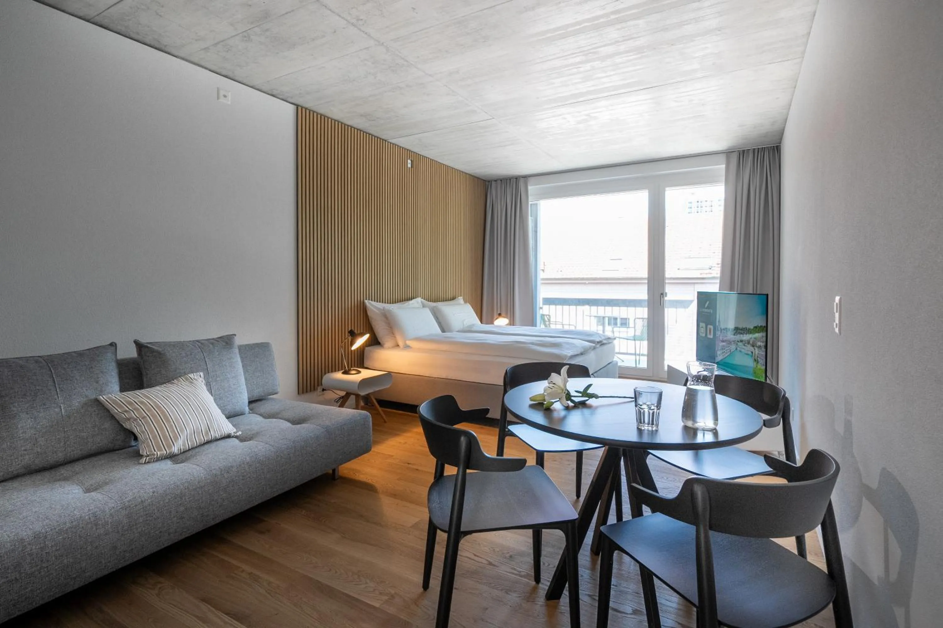 Living room in Aparthotel Il Momento Bern Expo