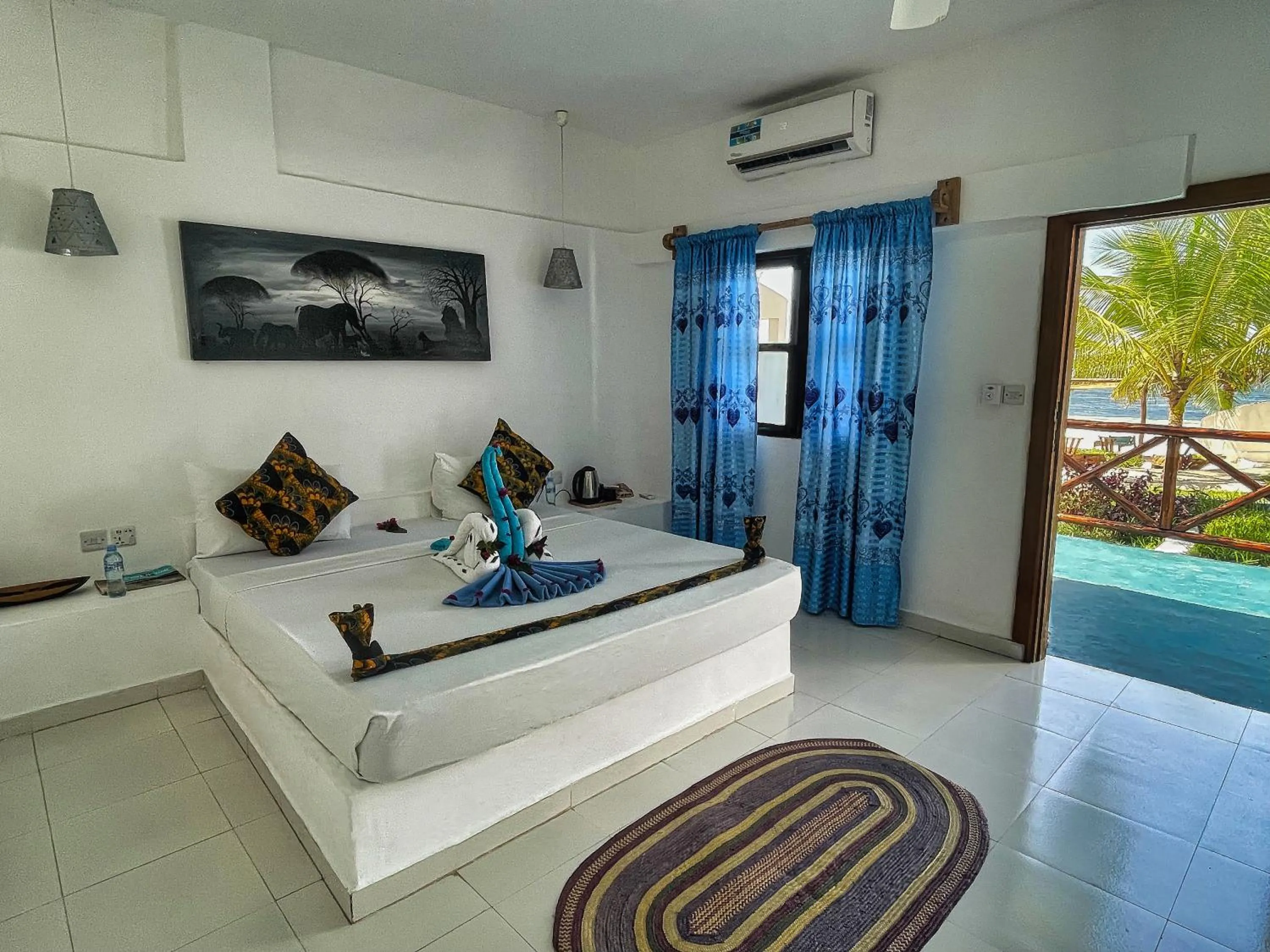 Bed in AVO Boutique Hotel