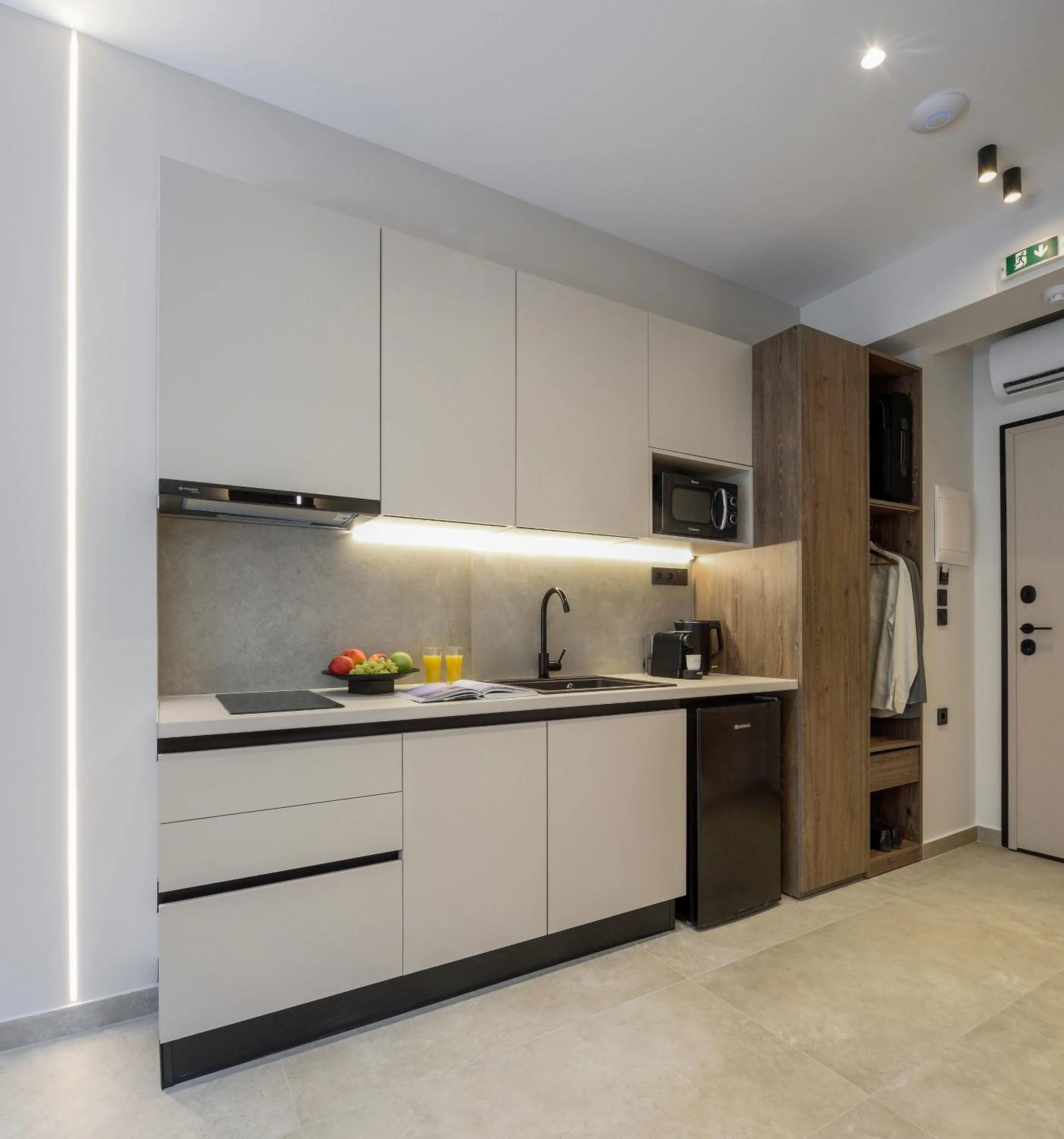 Kitchen or kitchenette in Loena Luxury Suites