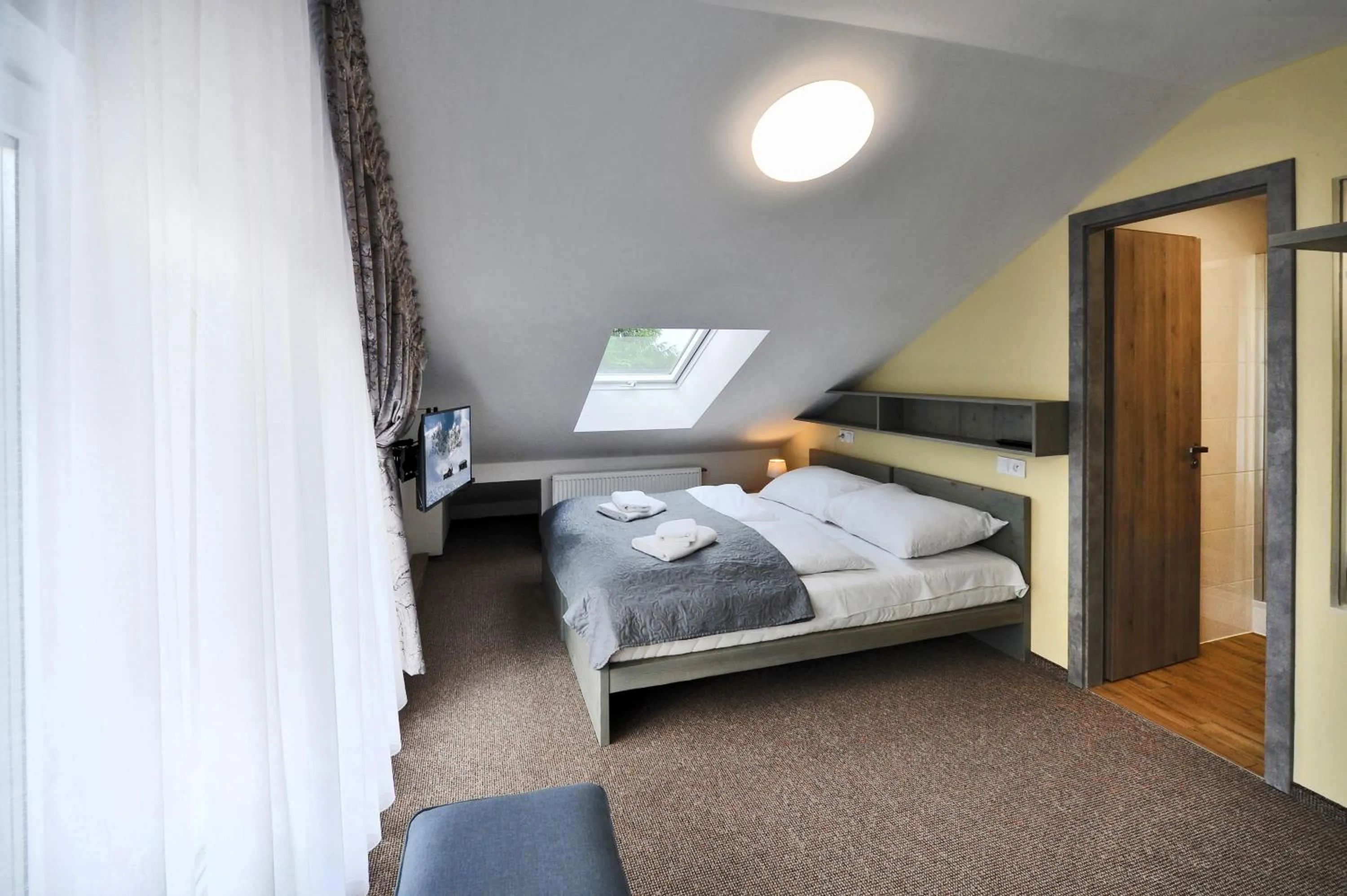 Bed in Aparthotel Belveder