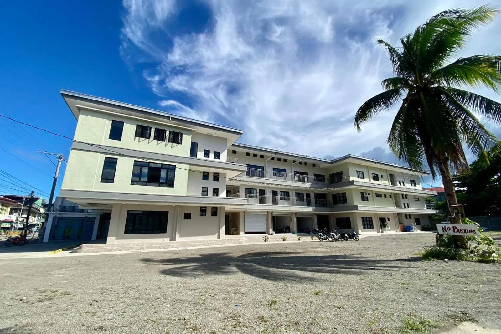 Property building in La Patria Baybay Tourist Inn powered by Cocotel