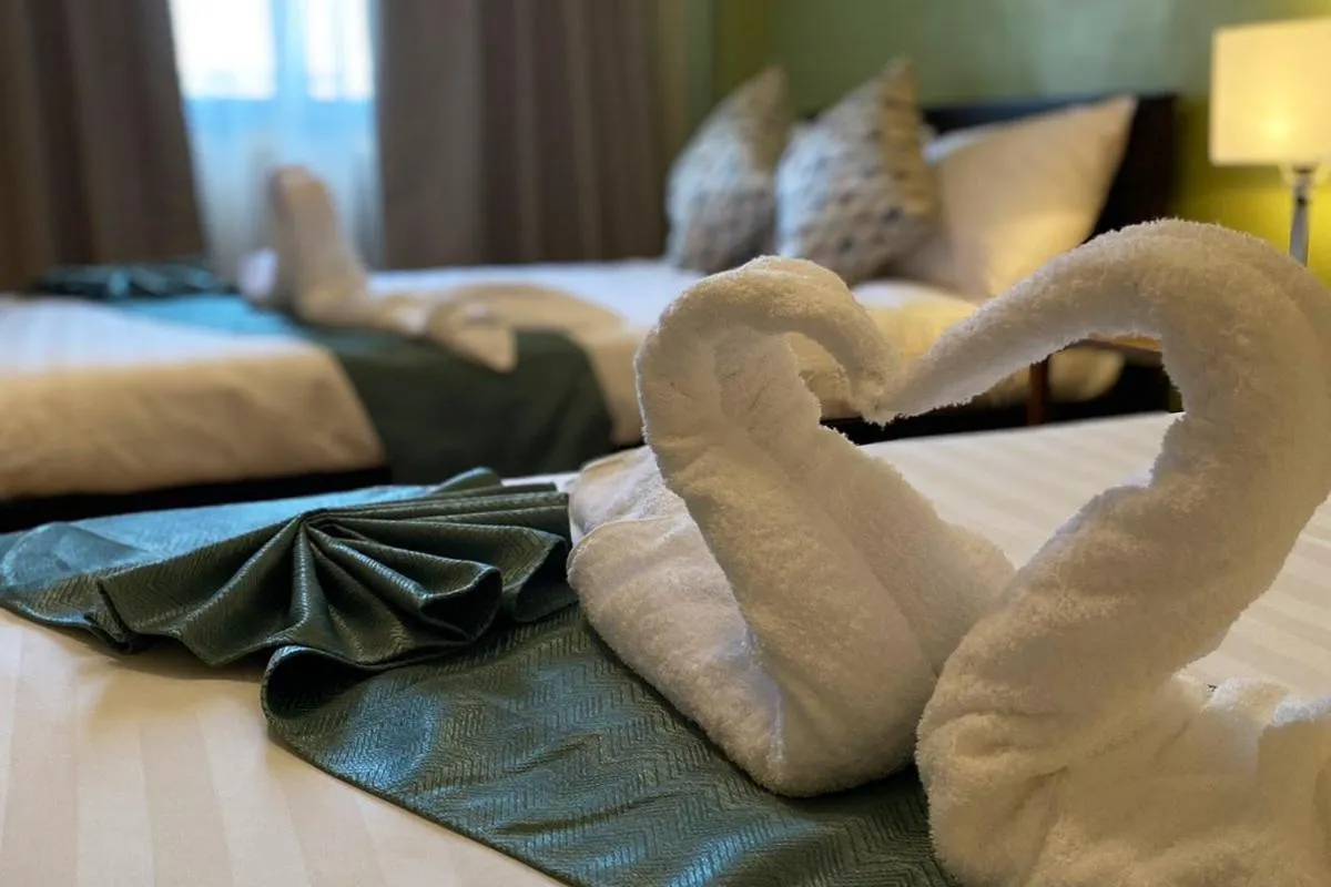 Bed in La Patria Baybay Tourist Inn powered by Cocotel