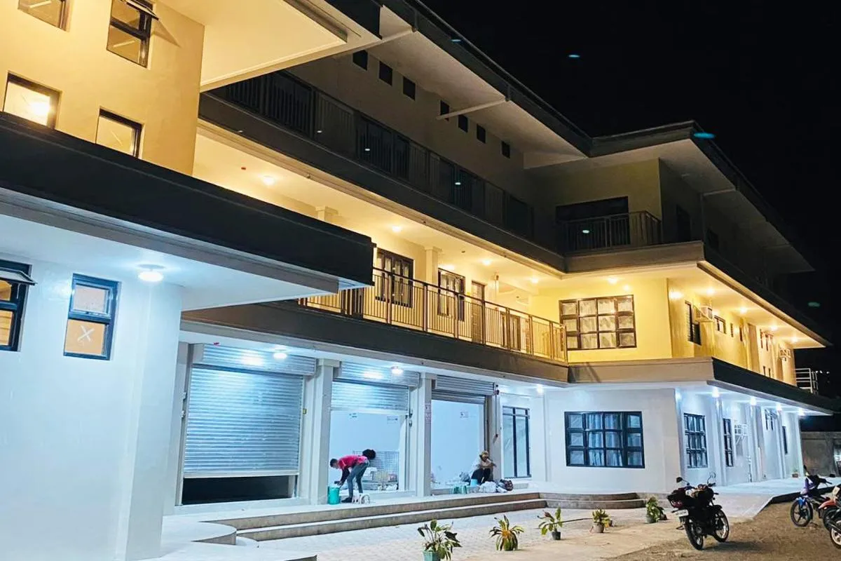 Property building in La Patria Baybay Tourist Inn powered by Cocotel