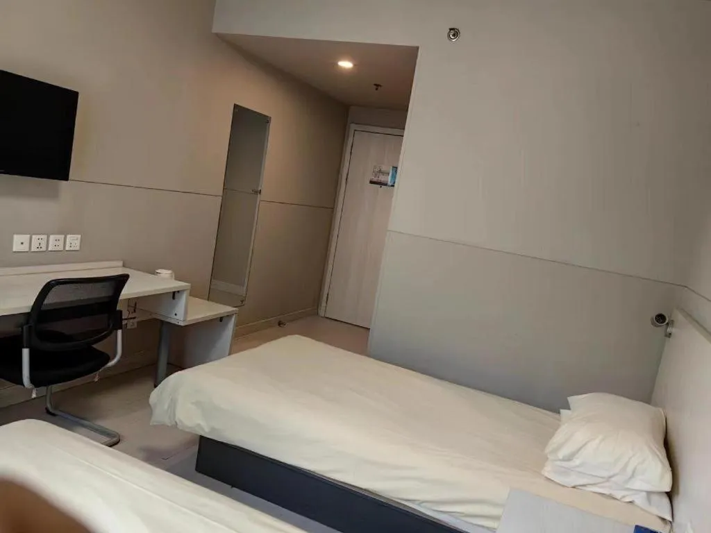 Bed in Jinjiang Inn Shanghai Qingpu