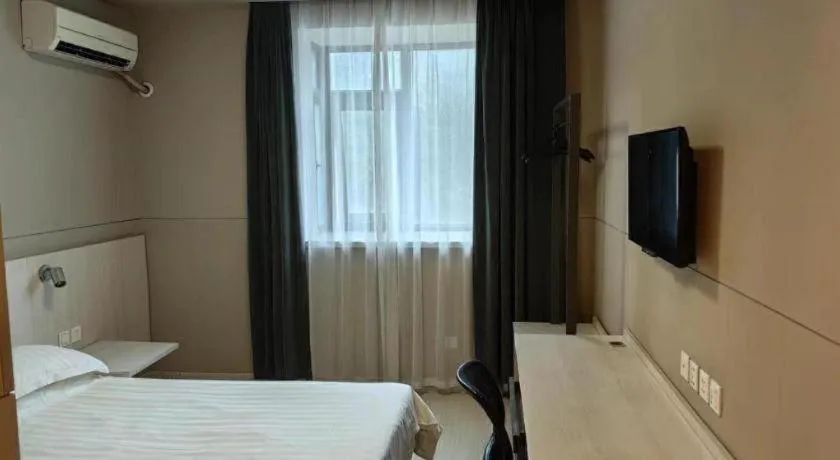 Bed in Jinjiang Inn Shanghai Qingpu