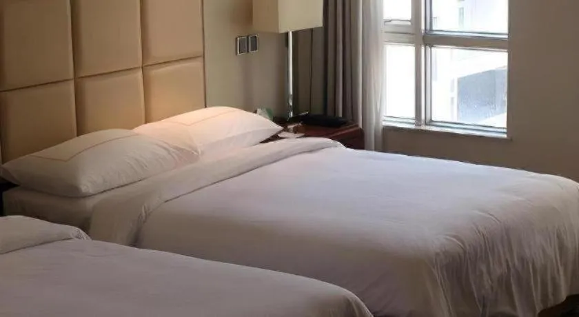 Bed in Xiamen Fortune Hotel