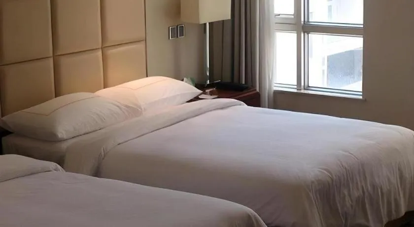 Bed in Xiamen Fortune Hotel