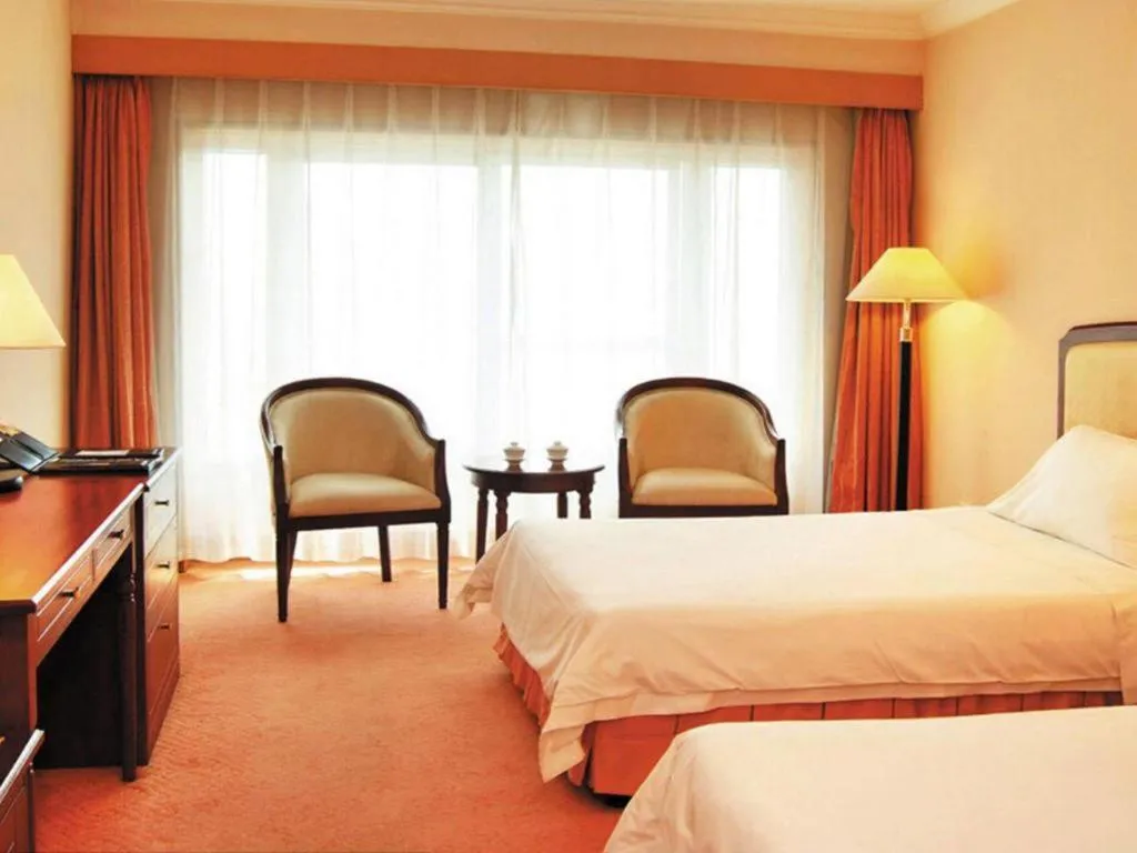 Bed in Dalian Zhongshan Hotel