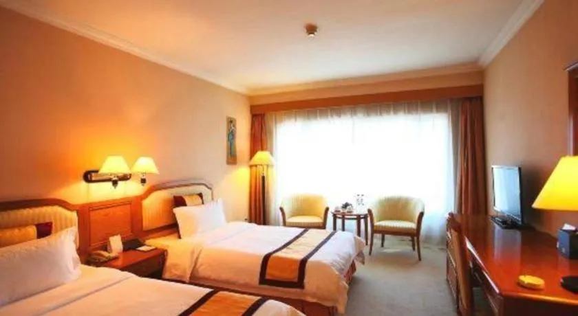 Bed in Dalian Zhongshan Hotel