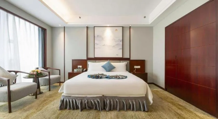Bed in Yiyang Huatian Hotel