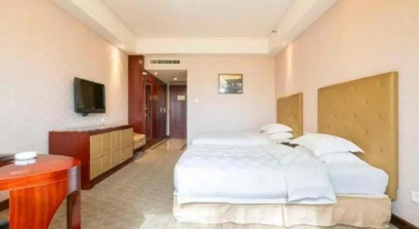 Bed in Yiyang Huatian Hotel