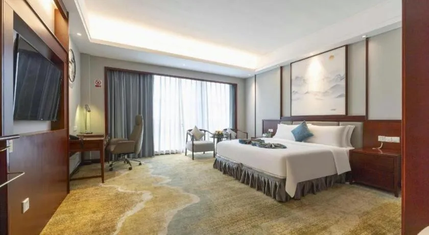 Bed in Yiyang Huatian Hotel