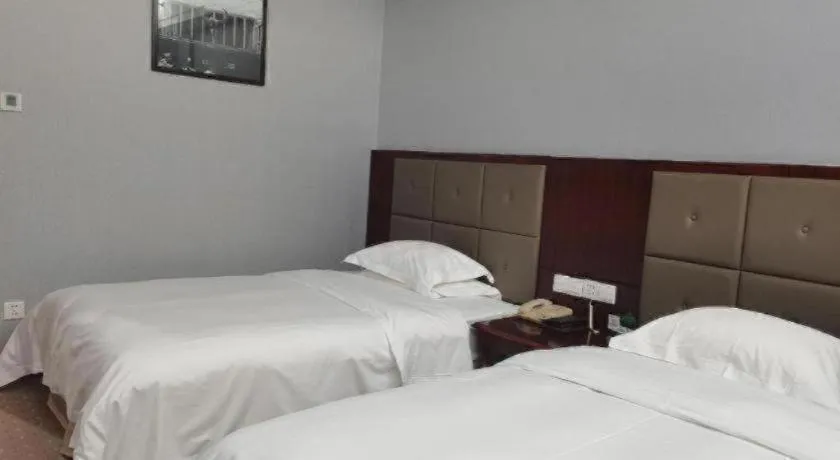 Bed in Yiyang Huatian Hotel