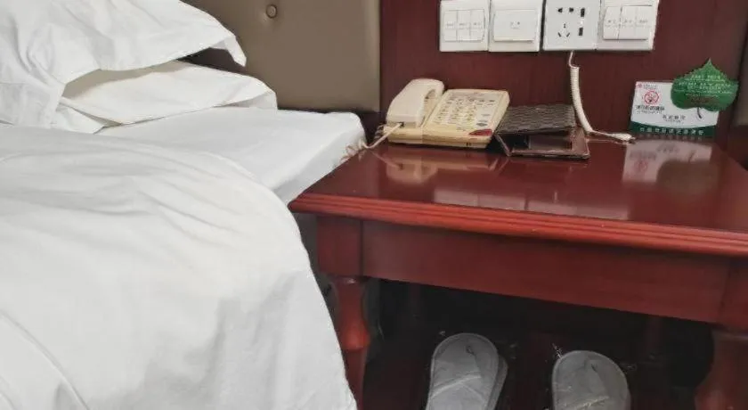 Bed in Yiyang Huatian Hotel