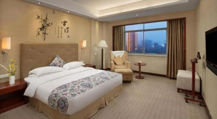 Bed in Yiyang Huatian Hotel