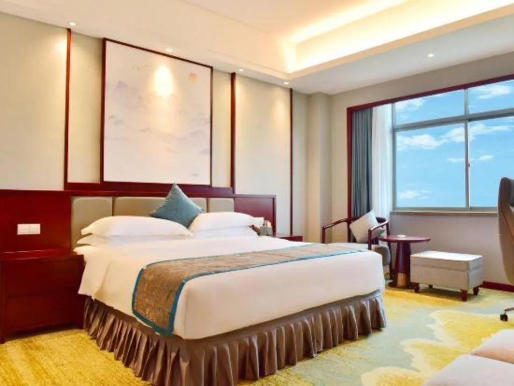 Bed in Yiyang Huatian Hotel