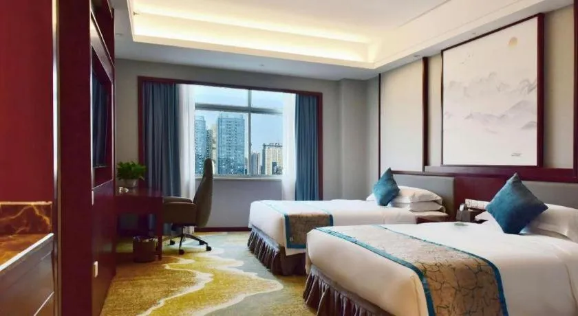 Bed in Yiyang Huatian Hotel