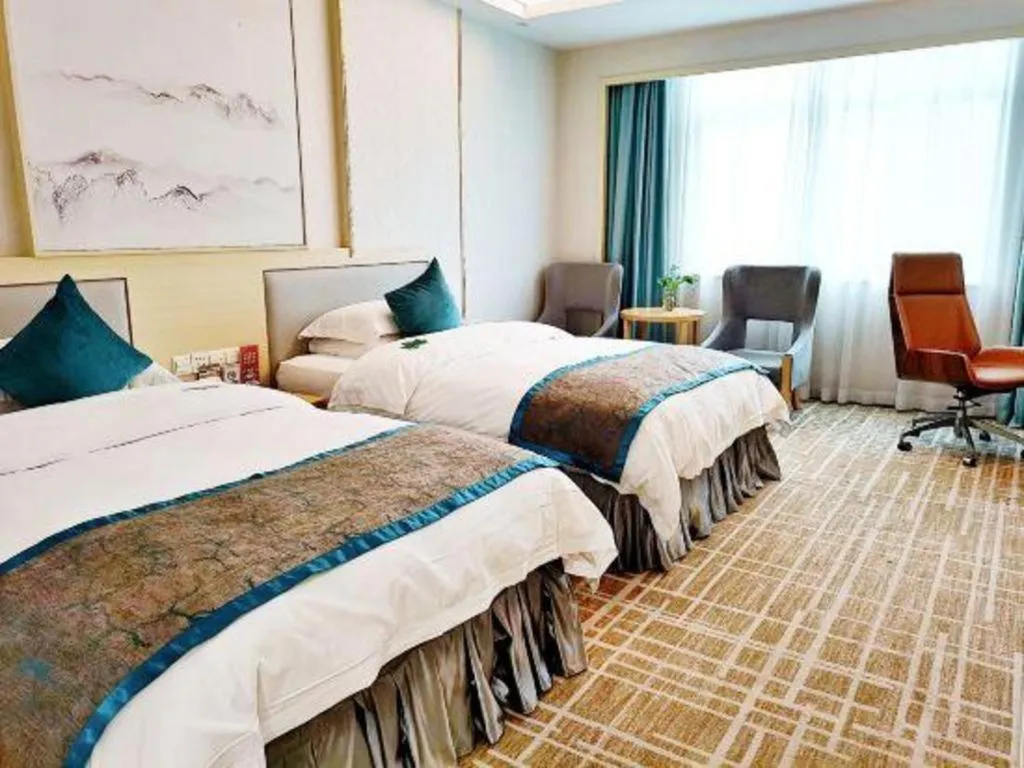 Bed in Yiyang Huatian Hotel