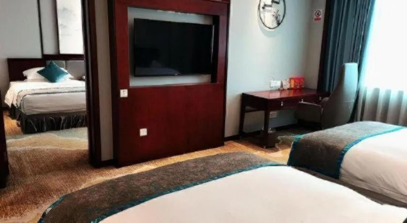 Bed in Yiyang Huatian Hotel