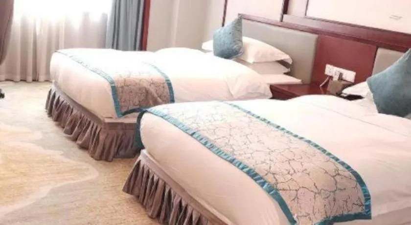 Bed in Yiyang Huatian Hotel