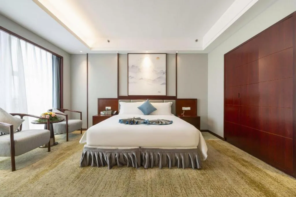 Bed in Yiyang Huatian Hotel