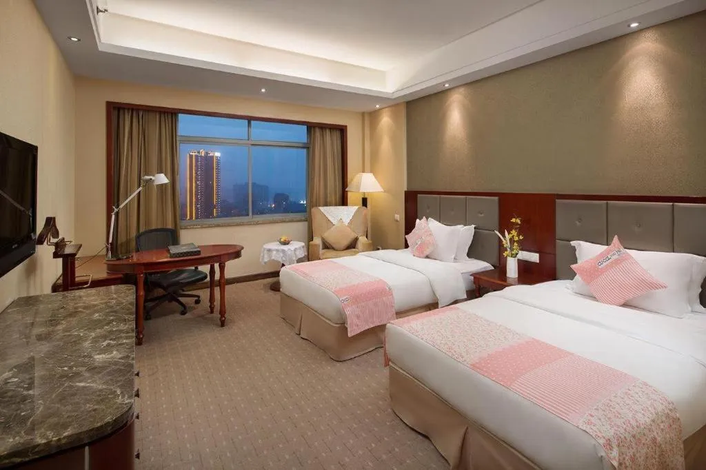 Bed in Yiyang Huatian Hotel