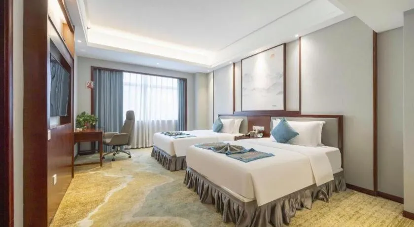 Bed in Yiyang Huatian Hotel