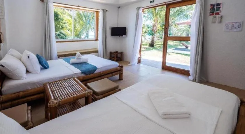 Bed in Elysia Beach Resort