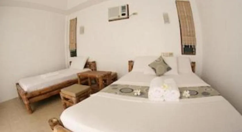 Bed in Elysia Beach Resort